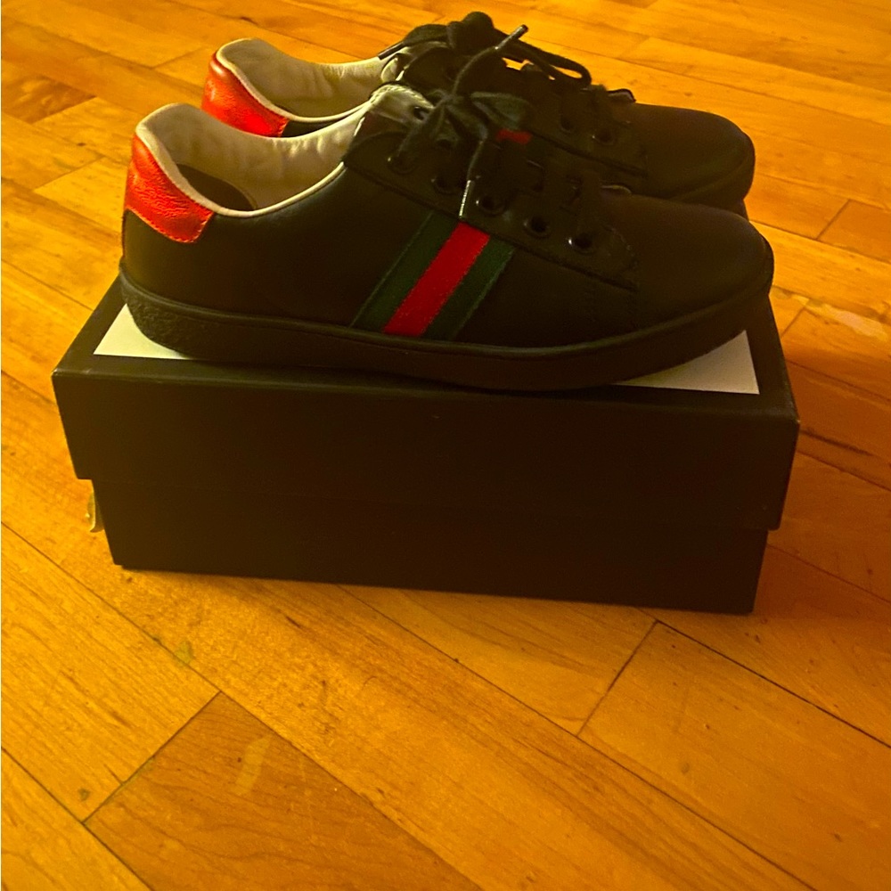 Gucci black lace up trainers